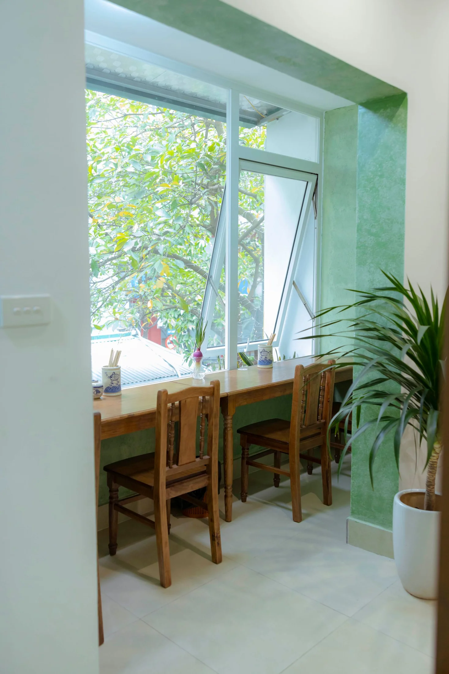 Cafe seating beside a large window