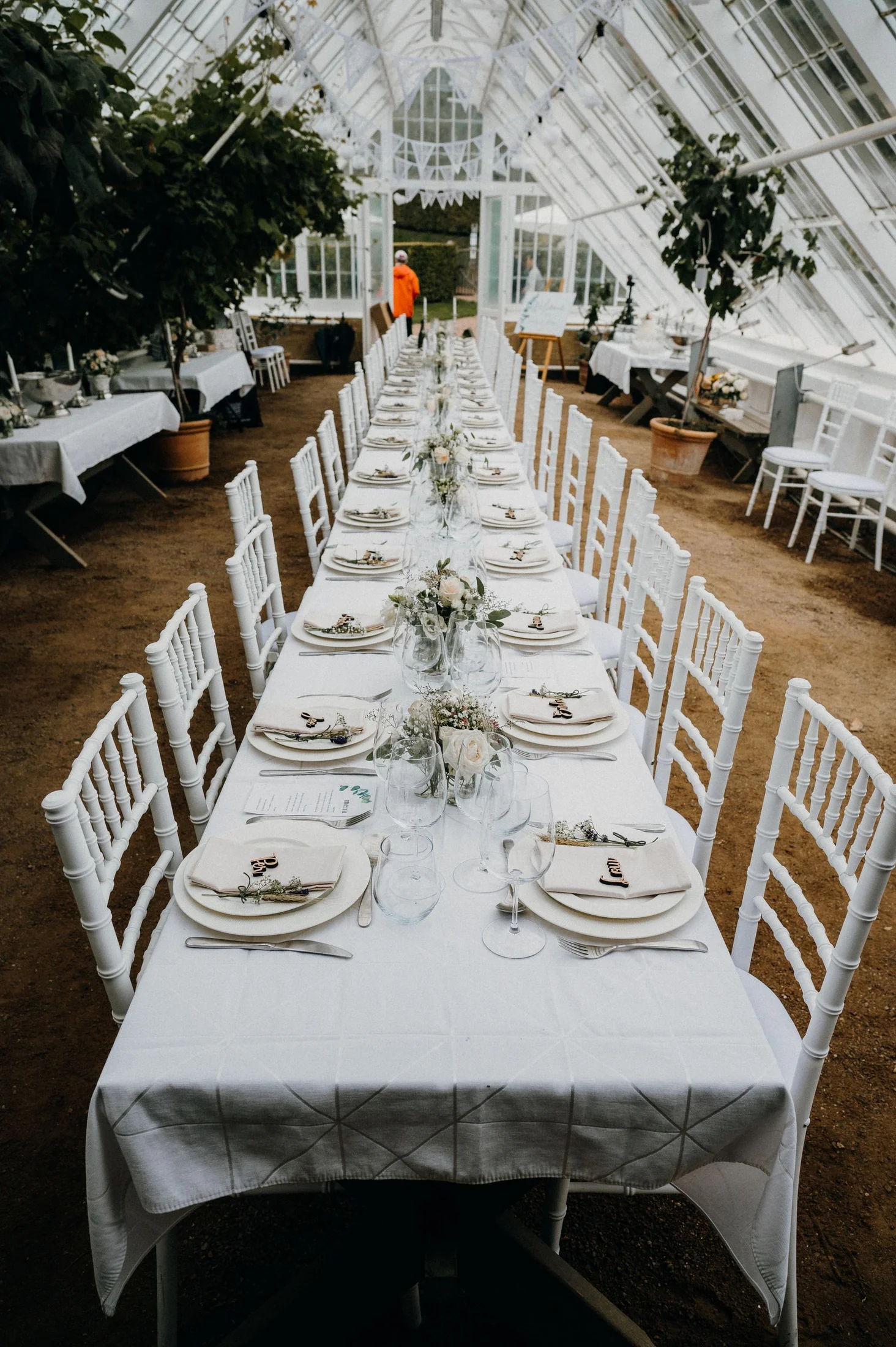 A reception table under a conservatory glass roof