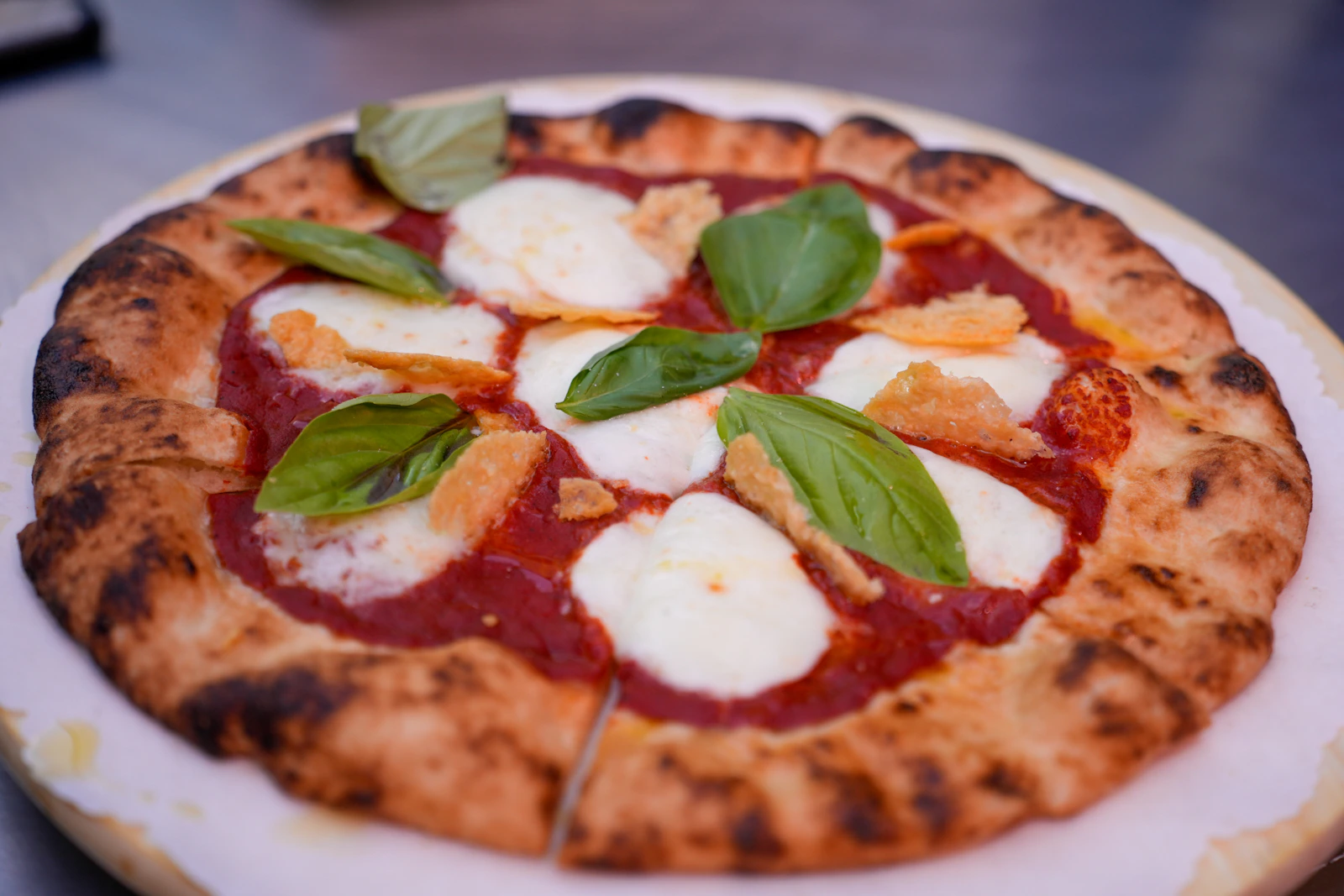 Pizza with a blistered crust